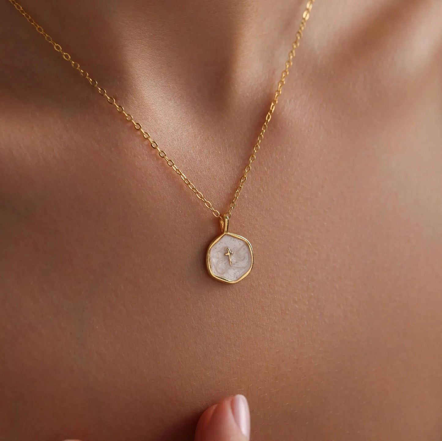 Beautiful white pendant with golden chain