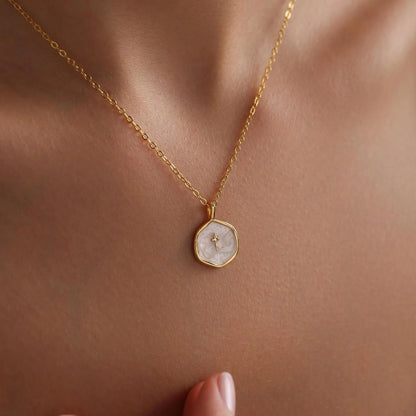 Beautiful white pendant with golden chain
