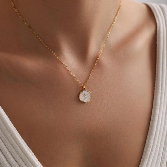Beautiful white pendant with golden chain